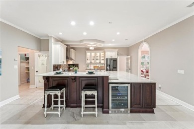 Tucked in Atlanta Country Clubs quiet interior, this refreshed on Atlanta Country Club in Georgia - for sale on GolfHomes.com, golf home, golf lot