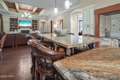 Nestled in a serene setting with views of a pond and golf course on Bay Point Resort Golf Club in Florida - for sale on GolfHomes.com, golf home, golf lot
