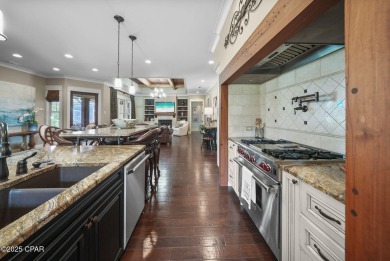 Nestled in a serene setting with views of a pond and golf course on Bay Point Resort Golf Club in Florida - for sale on GolfHomes.com, golf home, golf lot