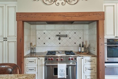 Nestled in a serene setting with views of a pond and golf course on Bay Point Resort Golf Club in Florida - for sale on GolfHomes.com, golf home, golf lot