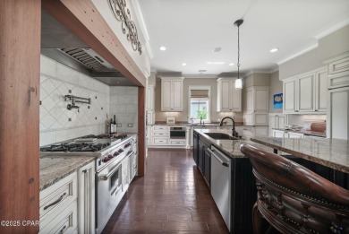 Nestled in a serene setting with views of a pond and golf course on Bay Point Resort Golf Club in Florida - for sale on GolfHomes.com, golf home, golf lot