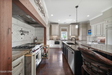 Nestled in a serene setting with views of a pond and golf course on Bay Point Resort Golf Club in Florida - for sale on GolfHomes.com, golf home, golf lot