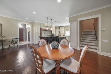 Nestled in a serene setting with views of a pond and golf course on Bay Point Resort Golf Club in Florida - for sale on GolfHomes.com, golf home, golf lot