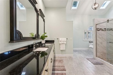 Tucked in Atlanta Country Clubs quiet interior, this refreshed on Atlanta Country Club in Georgia - for sale on GolfHomes.com, golf home, golf lot