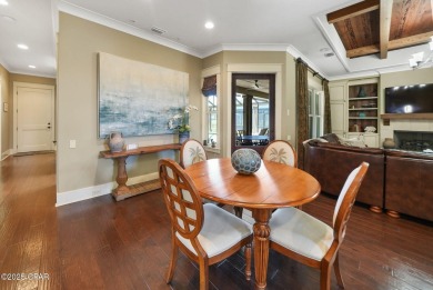 Nestled in a serene setting with views of a pond and golf course on Bay Point Resort Golf Club in Florida - for sale on GolfHomes.com, golf home, golf lot