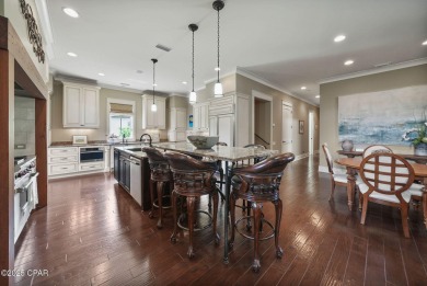 Nestled in a serene setting with views of a pond and golf course on Bay Point Resort Golf Club in Florida - for sale on GolfHomes.com, golf home, golf lot