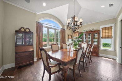 Nestled in a serene setting with views of a pond and golf course on Bay Point Resort Golf Club in Florida - for sale on GolfHomes.com, golf home, golf lot
