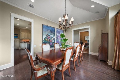 Nestled in a serene setting with views of a pond and golf course on Bay Point Resort Golf Club in Florida - for sale on GolfHomes.com, golf home, golf lot