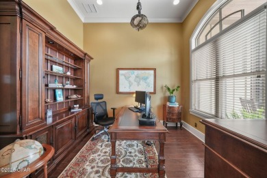 Nestled in a serene setting with views of a pond and golf course on Bay Point Resort Golf Club in Florida - for sale on GolfHomes.com, golf home, golf lot