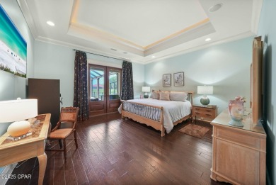 Nestled in a serene setting with views of a pond and golf course on Bay Point Resort Golf Club in Florida - for sale on GolfHomes.com, golf home, golf lot