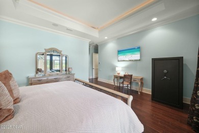 Nestled in a serene setting with views of a pond and golf course on Bay Point Resort Golf Club in Florida - for sale on GolfHomes.com, golf home, golf lot