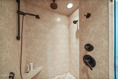 Wow - Price improvement of $100,000 on this luxury custom on Bay Point Resort Golf Club in Florida - for sale on GolfHomes.com, golf home, golf lot