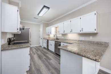 Welcome to this beautifully maintained 3-bedroom, 2-bath on Tiger Point Golf and Country Club in Florida - for sale on GolfHomes.com, golf home, golf lot