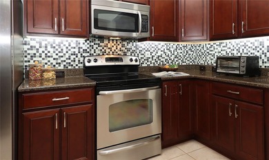 This gorgeous Lantana is located in the Village of Saint Charles on Glenview Championship Golf and Country Club in Florida - for sale on GolfHomes.com, golf home, golf lot