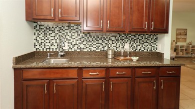 This gorgeous Lantana is located in the Village of Saint Charles on Glenview Championship Golf and Country Club in Florida - for sale on GolfHomes.com, golf home, golf lot