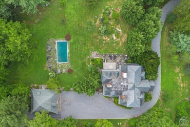 The Birches is the stone gate house formerly associated with the on Highlands Country Club in New York - for sale on GolfHomes.com, golf home, golf lot