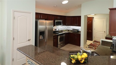 This gorgeous Lantana is located in the Village of Saint Charles on Glenview Championship Golf and Country Club in Florida - for sale on GolfHomes.com, golf home, golf lot