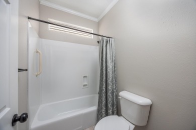 Welcome to this beautifully maintained 3-bedroom, 2-bath on Tiger Point Golf and Country Club in Florida - for sale on GolfHomes.com, golf home, golf lot