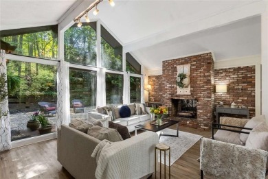 Welcome to this beautiful mid-century ranch-style house located on Rivermont Golf and Country Club in Georgia - for sale on GolfHomes.com, golf home, golf lot