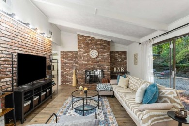 Welcome to this beautiful mid-century ranch-style house located on Rivermont Golf and Country Club in Georgia - for sale on GolfHomes.com, golf home, golf lot