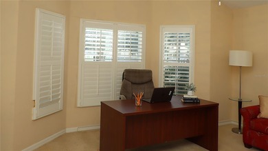 This gorgeous Lantana is located in the Village of Saint Charles on Glenview Championship Golf and Country Club in Florida - for sale on GolfHomes.com, golf home, golf lot