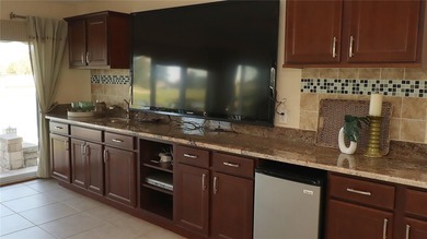 This gorgeous Lantana is located in the Village of Saint Charles on Glenview Championship Golf and Country Club in Florida - for sale on GolfHomes.com, golf home, golf lot