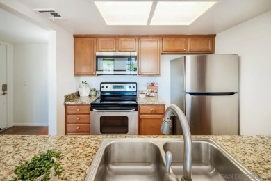 Charming ground-floor condo in Rancho Bernardo, freshly painted on Oaks North Golf Course in California - for sale on GolfHomes.com, golf home, golf lot