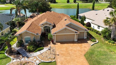 This gorgeous Lantana is located in the Village of Saint Charles on Glenview Championship Golf and Country Club in Florida - for sale on GolfHomes.com, golf home, golf lot