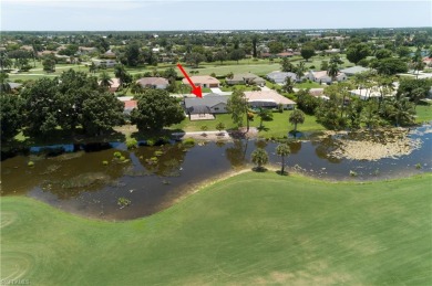 Tropical, lushly landscaped .27 acre lot with tranquil lagoon on Royal Palm Golf Club in Florida - for sale on GolfHomes.com, golf home, golf lot