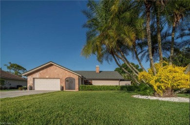 Tropical, lushly landscaped .27 acre lot with tranquil lagoon on Royal Palm Golf Club in Florida - for sale on GolfHomes.com, golf home, golf lot