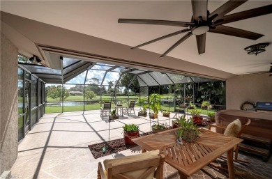 Tropical, lushly landscaped .27 acre lot with tranquil lagoon on Royal Palm Golf Club in Florida - for sale on GolfHomes.com, golf home, golf lot