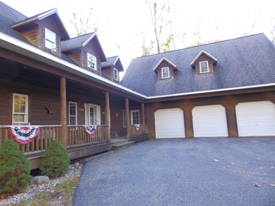 Welcome to this beautifully maintained Northern Michigan getaway on Michaywe Pines Course in Michigan - for sale on GolfHomes.com, golf home, golf lot