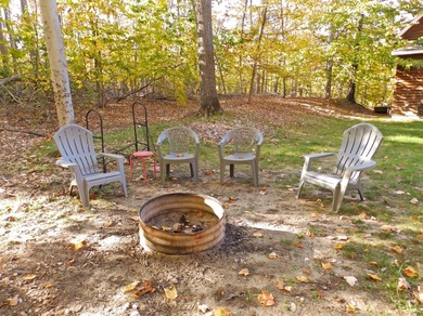 Welcome to this beautifully maintained Northern Michigan getaway on Michaywe Pines Course in Michigan - for sale on GolfHomes.com, golf home, golf lot