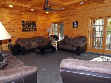 Welcome to this beautifully maintained Northern Michigan getaway on Michaywe Pines Course in Michigan - for sale on GolfHomes.com, golf home, golf lot