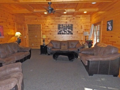 Welcome to this beautifully maintained Northern Michigan getaway on Michaywe Pines Course in Michigan - for sale on GolfHomes.com, golf home, golf lot