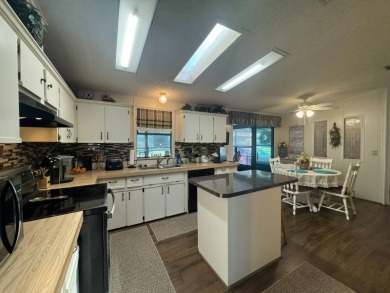 Who says you can't have it all! This FURNISHED home boasts 1,827 on The Meadows At Countrywood in Florida - for sale on GolfHomes.com, golf home, golf lot
