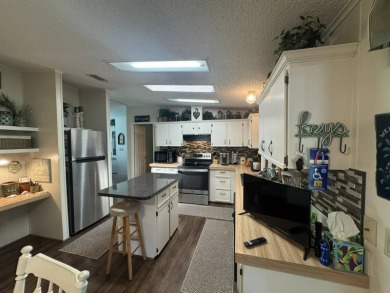 Who says you can't have it all! This FURNISHED home boasts 1,827 on The Meadows At Countrywood in Florida - for sale on GolfHomes.com, golf home, golf lot