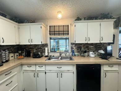 Who says you can't have it all! This FURNISHED home boasts 1,827 on The Meadows At Countrywood in Florida - for sale on GolfHomes.com, golf home, golf lot