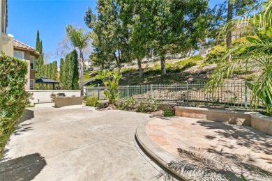 Nestled in the heart of Dove Canyon, this captivating residence on Dove Canyon Country Club in California - for sale on GolfHomes.com, golf home, golf lot