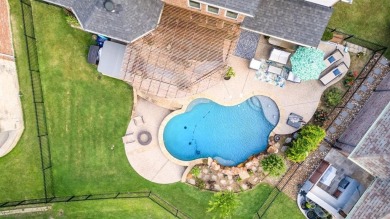 Located in a prestigious gated community in Frisco, this on Heritage Lakes - Par 3 - 9 Hole Course in Texas - for sale on GolfHomes.com, golf home, golf lot