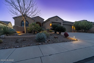 This home on the 9th hole offers mountain, water, and golf on Canoa Ranch Golf Club in Arizona - for sale on GolfHomes.com, golf home, golf lot