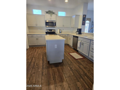 Discover this fully furnished Sun City Grand home in a quiet on Sun City Grand Golf Couse and Club in Arizona - for sale on GolfHomes.com, golf home, golf lot