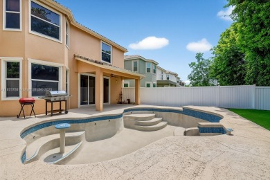 Spacious 5BR, 2.5BA home in Madison Green, Royal Palm Beach on The Links At Madison Green in Florida - for sale on GolfHomes.com, golf home, golf lot