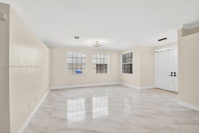 Spacious 5BR, 2.5BA home in Madison Green, Royal Palm Beach on The Links At Madison Green in Florida - for sale on GolfHomes.com, golf home, golf lot