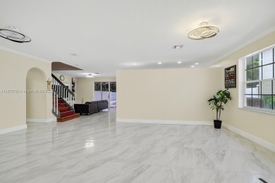 Spacious 5BR, 2.5BA home in Madison Green, Royal Palm Beach on The Links At Madison Green in Florida - for sale on GolfHomes.com, golf home, golf lot