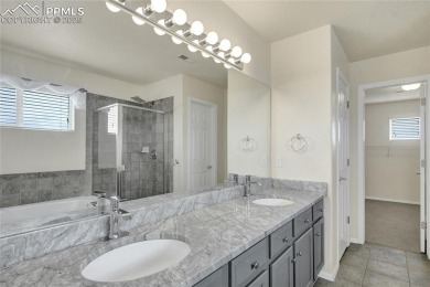 Welcoming home in a golf course community, situated on almost a on Antler Creek Golf Course in Colorado - for sale on GolfHomes.com, golf home, golf lot