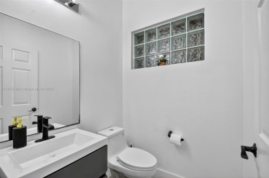 Spacious 5BR, 2.5BA home in Madison Green, Royal Palm Beach on The Links At Madison Green in Florida - for sale on GolfHomes.com, golf home, golf lot