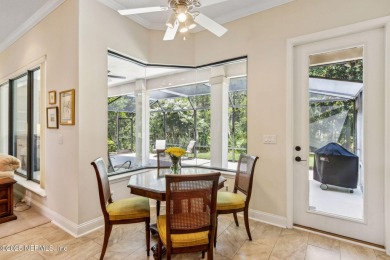 Stunning Amelia National home on a premier lot tucked into a on Amelia National Golf and Country Club in Florida - for sale on GolfHomes.com, golf home, golf lot