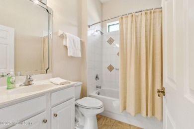 Stunning Amelia National home on a premier lot tucked into a on Amelia National Golf and Country Club in Florida - for sale on GolfHomes.com, golf home, golf lot