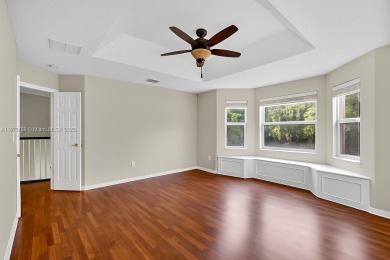 Spacious 5BR, 2.5BA home in Madison Green, Royal Palm Beach on The Links At Madison Green in Florida - for sale on GolfHomes.com, golf home, golf lot